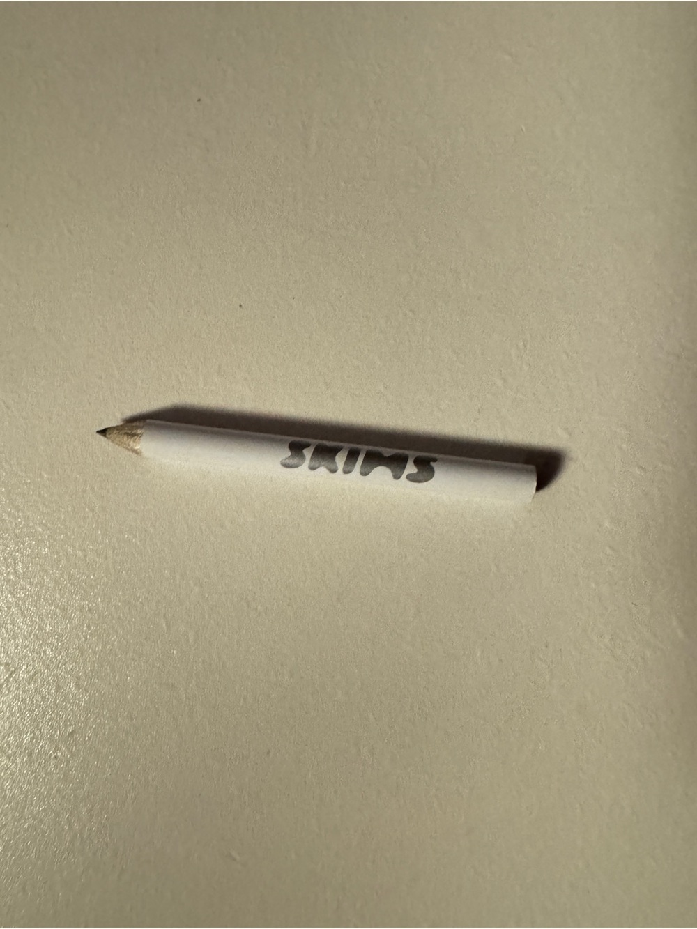 Exclusive Community goods SKIMS White Mini Pencil with Bold Logo